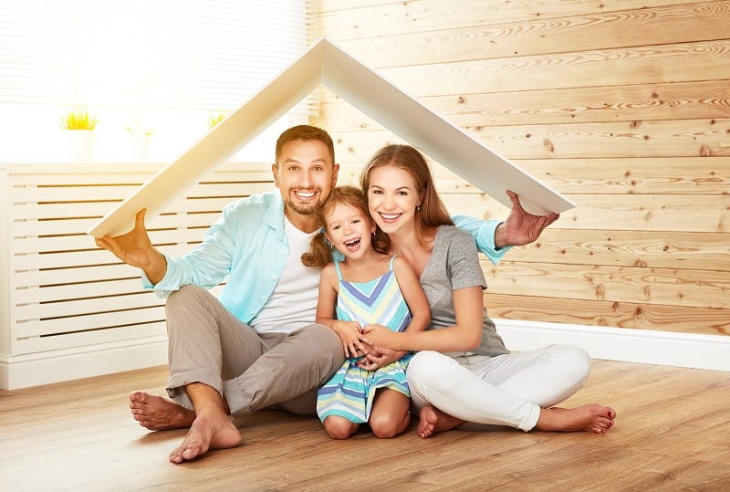 happy family with a safe roof after roof repair